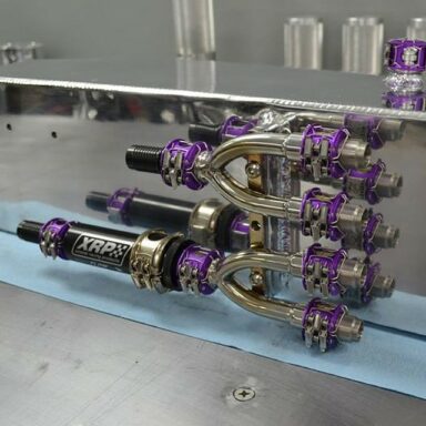 Chip Ursu’s Fuel DIS Manifold creation looks like a piece of artwork! From Chips Motorsports LLC iMadison Heights, MI.  A beautiful piece of work using XRP’s Clamshell style Space Saver Fuel Filter and Hydraflow Clamshell couplers from XRP