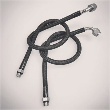 New and unique! Highly flexible, smooth bore PTFE 3/16″ ID ProPLUS Race Hose makes for perfect high flowing fuel injector lines assembled with full flowing 316 stainless end fittings that have a .150″ thru hole to mate with -3 fuel injector nozzles that have the common 3/8″-24 SAE 45 degree flare nose. Shown with direct -3 male port ORB ends. Also available with standard AN style -3 and -4, 37 degree flare seats in straights and all bend angles. These lines flex like rubber but offer the full protection of smooth PTFE against alcohol and nitro that degrades and hardens rubber hoses. Available braid coverings in XM Mono, Stainless Steel, Aramid and Silicone over both SS and Aramid.  @nhra