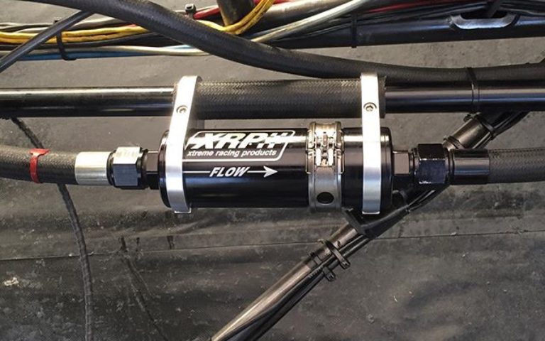 Clamshell Quick Release Inline Oil Filter from on the @jonnielindberg piloted racing Top Alcohol Funny Car. Note the clamshells are available in Super Nickel as well as standard purple. Oil or fuel use. Check it out at www.xrp.com