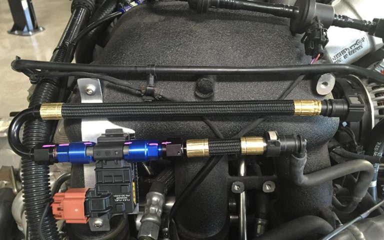 BBI Autosport using ProPLUS, smooth bore, PTFE Race Hose crimped to fuel line Quick Disconnects on one of their 997 Porsche GT2 builds with 9,000 RPM and 1,000 WHP flex fuel twin turbo GT3 engine package.  @BBIAutosport #997