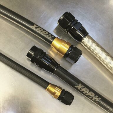 ProPLUS Reusable Hose Ends are now shipping! Field installable without crimping for all standard ProPLUS and ProPLUS Xtreme Race Hose braids and coverings, including the new XKS Aramid with black Silicone cover. Black hose ends with full or TD (turned down) swivel nuts with aerospace profile sockets in black, gold or Super Nickel finish. Bent tube hose ends in fixed or full swivel style ProPLUS Race Hose: A highly flexible, smooth bore, PTFE hose system that is inert to all racing oils and fuels