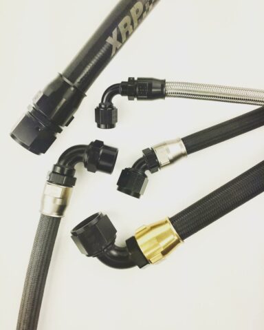 Race Reusable Hose Ends for field assembly without a crimping machine. Straight and Full-Swivel or Fixed angled tube ends are Black with a choice of sockets in Black, Gold or Super Nickel. XRP ProPLUS and ProPLUS Xtreme Racing Hose, smooth bore PTFE tube that is highly flexible and available in four braids and covering of XM Black Monofilament, XS Stainless, XK Aramid and XKS Aramid braid with a thin Black Silicone extruded cover. No flow restrictive internal convolutions just high flowing smooth PTFE that is compatible with all fuels and oils in racing