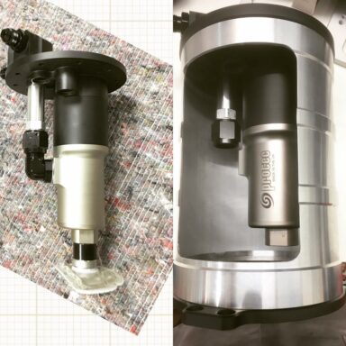 Continuing on with the PRI debut Sneak Peek….Now here is what is inside this beautiful new pressurized surge tank. How about a low amp draw brushless motor with integral controller that is driving a screw delivery fuel pump that, when connected to 13.8Vdc, is going to put out around 410 liters per hour (108 gallons) at 3 bar (about 44 psi) while drawing only 8 amps, yet will keep putting out 350 liters (93 gallons) at 6 bar (about 87psi) pulling down only 13.6 amps!?? Still want more fuel?? Stay tuned for the new brushless motor driven spur gear pumps coming to PRI as well that fit nicely inside these tanks as well as drop in units for the standard fuel cell oval fill plates Peninsula 225