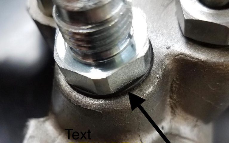 DO NOT DO THIS!! Here an XRP P/N 790586 Power Steering adapter, -6AN to 5/8”-18 Inverted Flare Seat, has been modified by another party to remove the designed Inverted Flare Seat Seal and an O-Ring was added to try and make it seal on the Female Port in a power steering rack.  This adapter does not have a HEX size large enough to fully cover and contain an O-Ring in the female port. The fluid pressure has pushed the O-Ring out, extruding it, and causing a dangerous power steering fluid leak. XRP does not approve of this modification or use of this adapter with an O-Ring. SWIPE Left for more